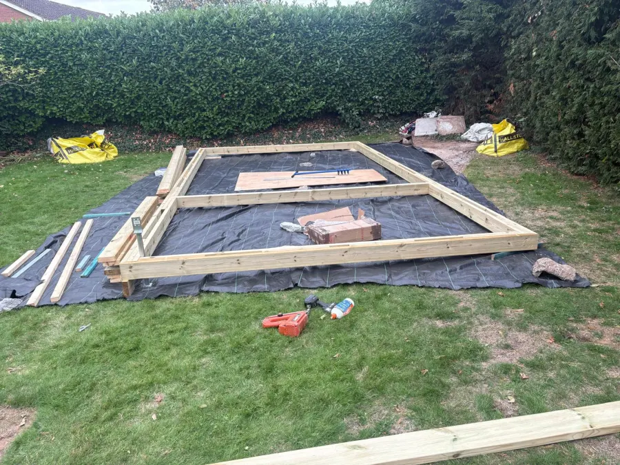 Timber stud-frame base for a garden room, ready for insulation