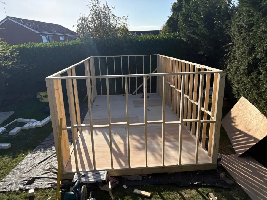 Timber-frame garden room under construction