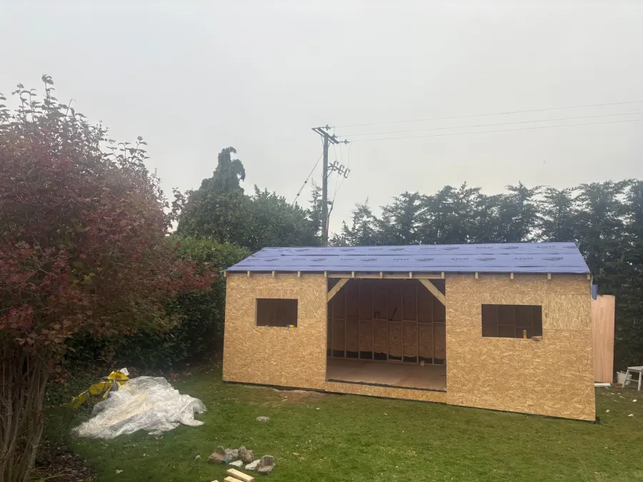 OSB-clad garden room shell, felted and ready for cladding