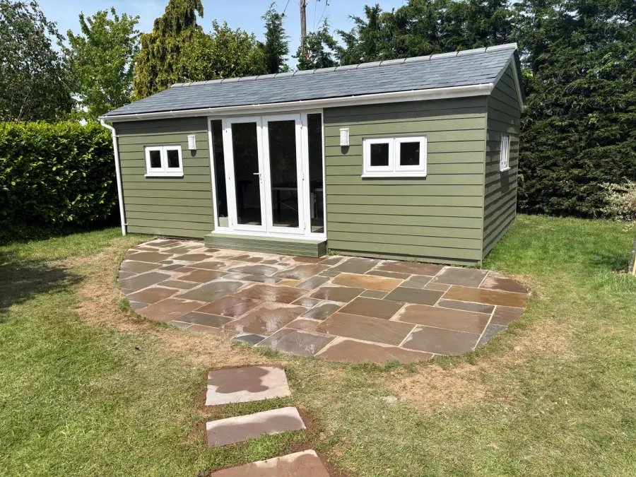 Completed garden room with full-width patio
