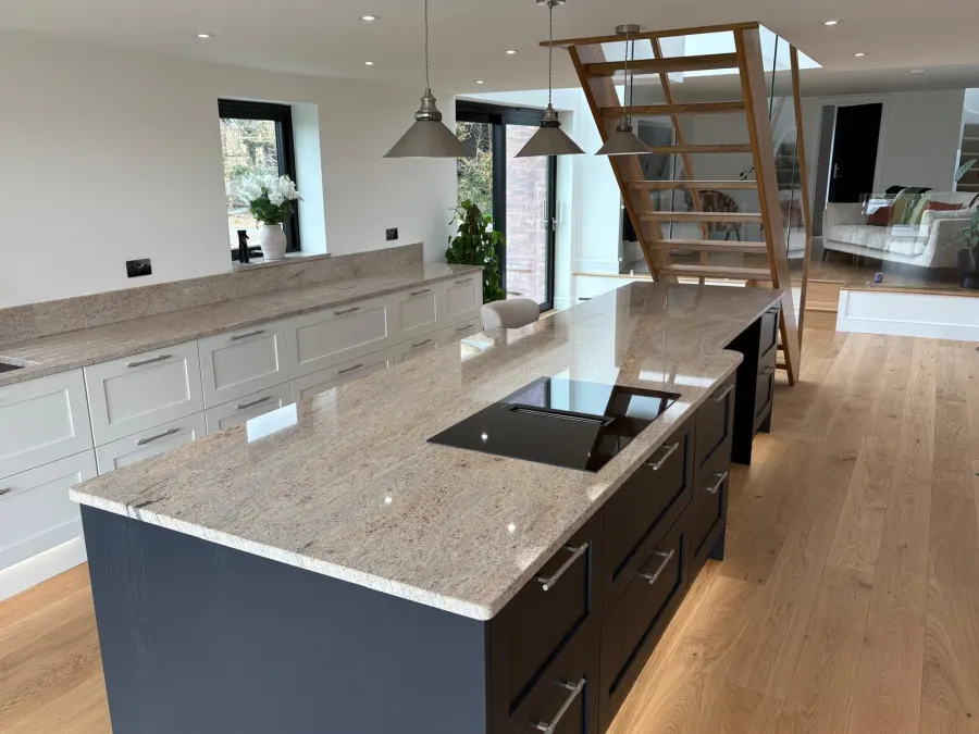 Cream and navy kitchen with fitted pantry storage